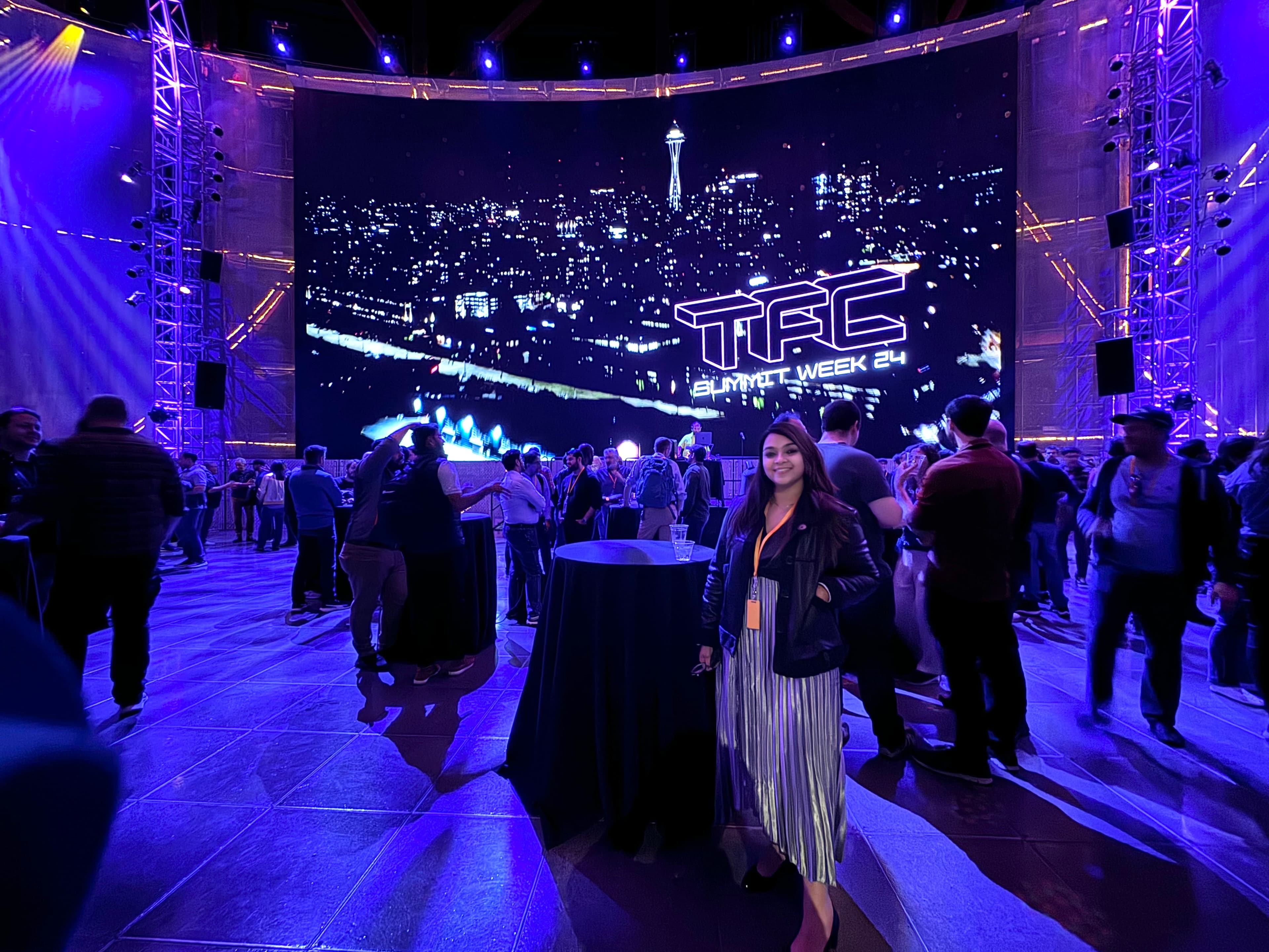Pallavi at TFC Summit Week 24, surrounded by the technology community